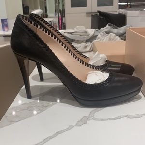 Prada black leather pumps